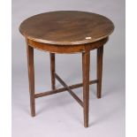 A mahogany circular occasional table on four square tapered legs with diagonal stretchers, bears