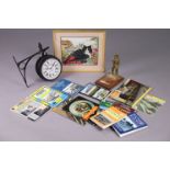 A modern railway station clock, boxed; various railway books; & a brass figure.