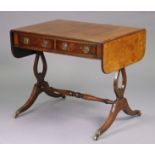 A regency mahogany sofa table with crossbanded top & rounded corners to the drop-leaves, fitted