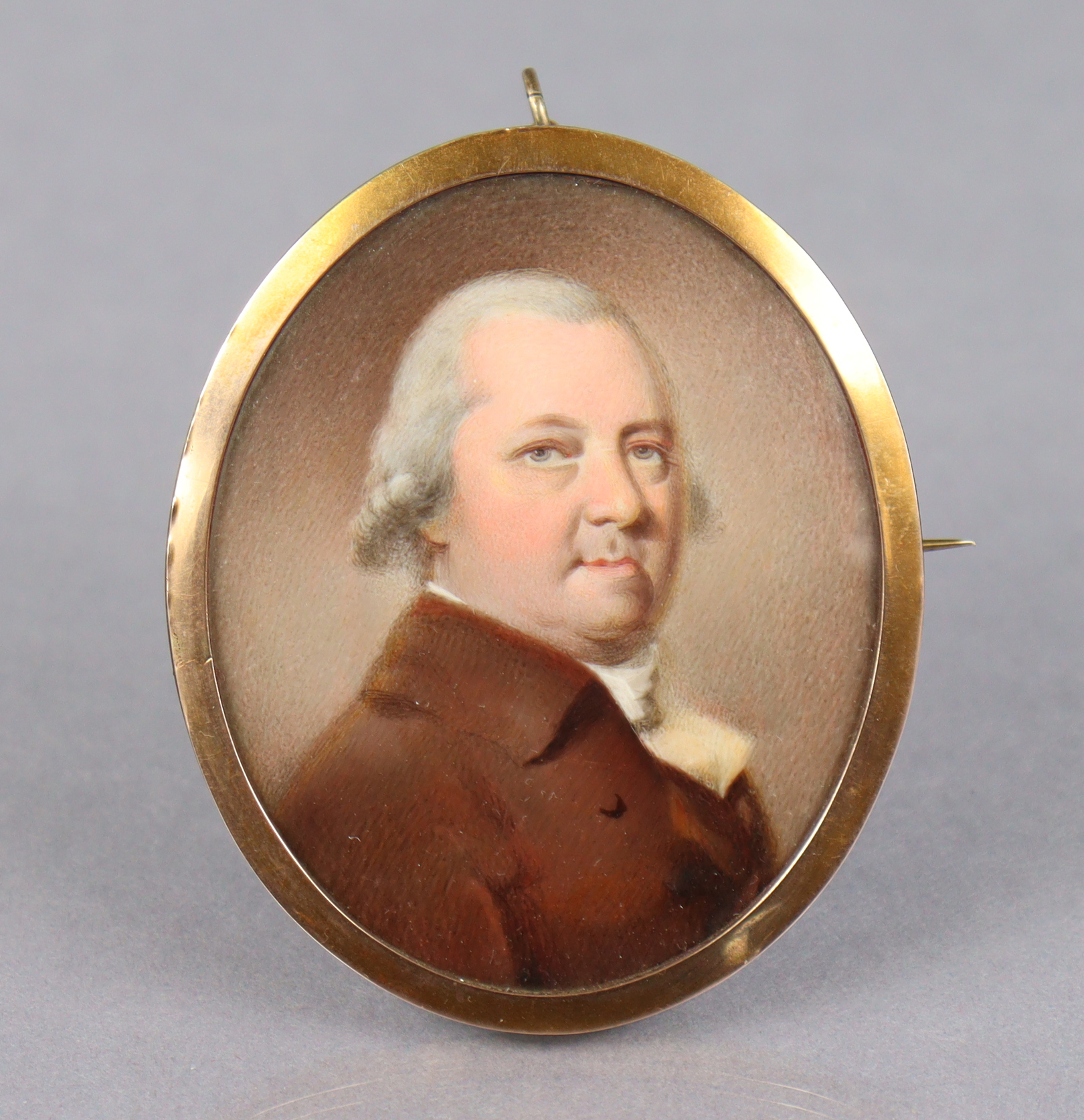 ENGLISH SCHOOL, late 18th century. A portrait miniature of a gentleman, head & shoulder length