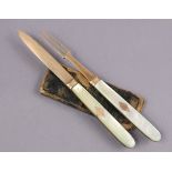 A pair of early/mid-19th century gilt metal folding pocket knife & fork with mother-of-pearl