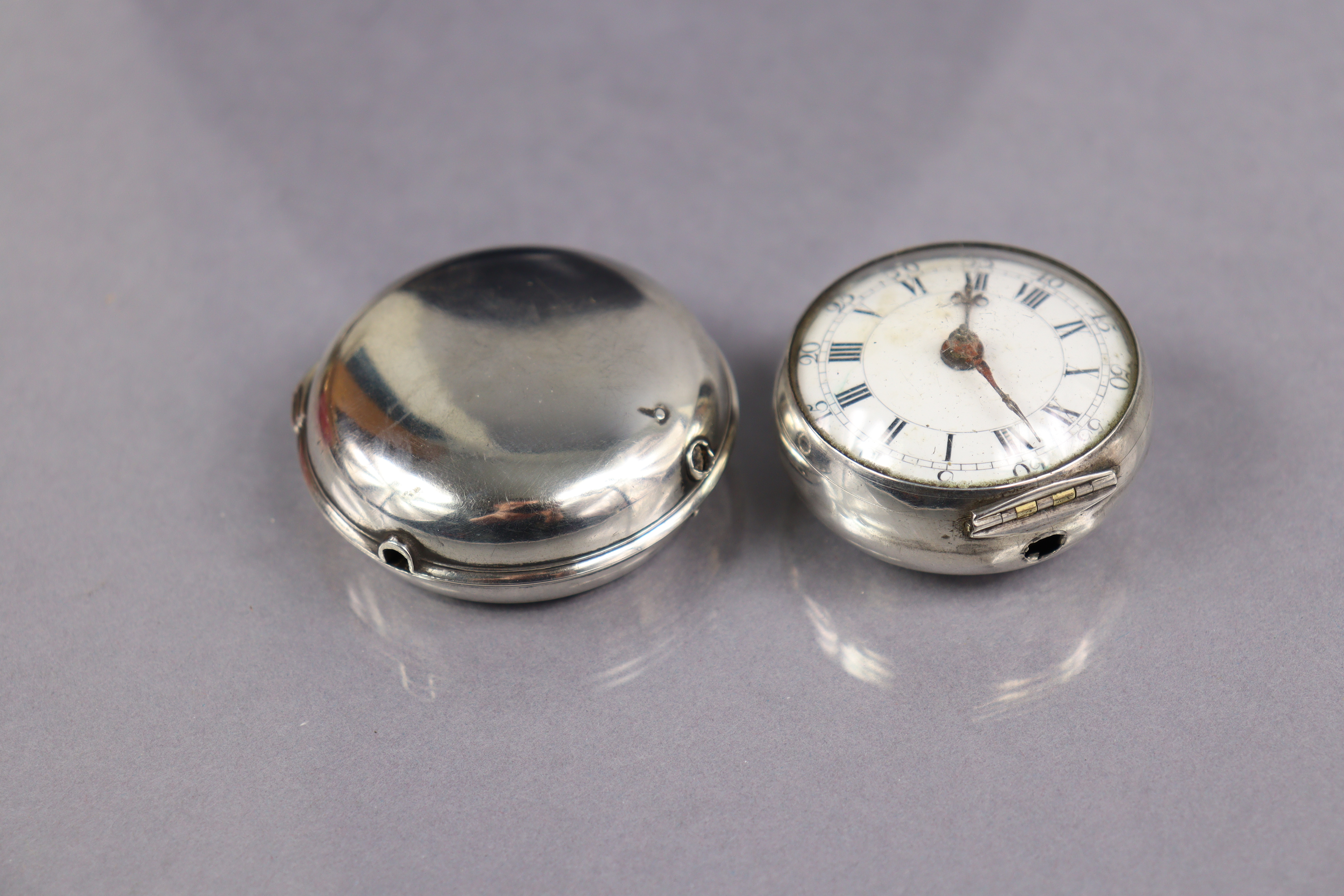 An 18th century silver pair-cased pocket watch, the convex white enamel dial with black roman - Image 7 of 8