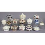 Thirteen 19th century English porcelain sucrieres, variously decorated; & a Booth’s pottery blue