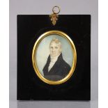 ENGLISH SCHOOL, early 19th century. A portrait miniature of a gentleman with curled blonde hair,