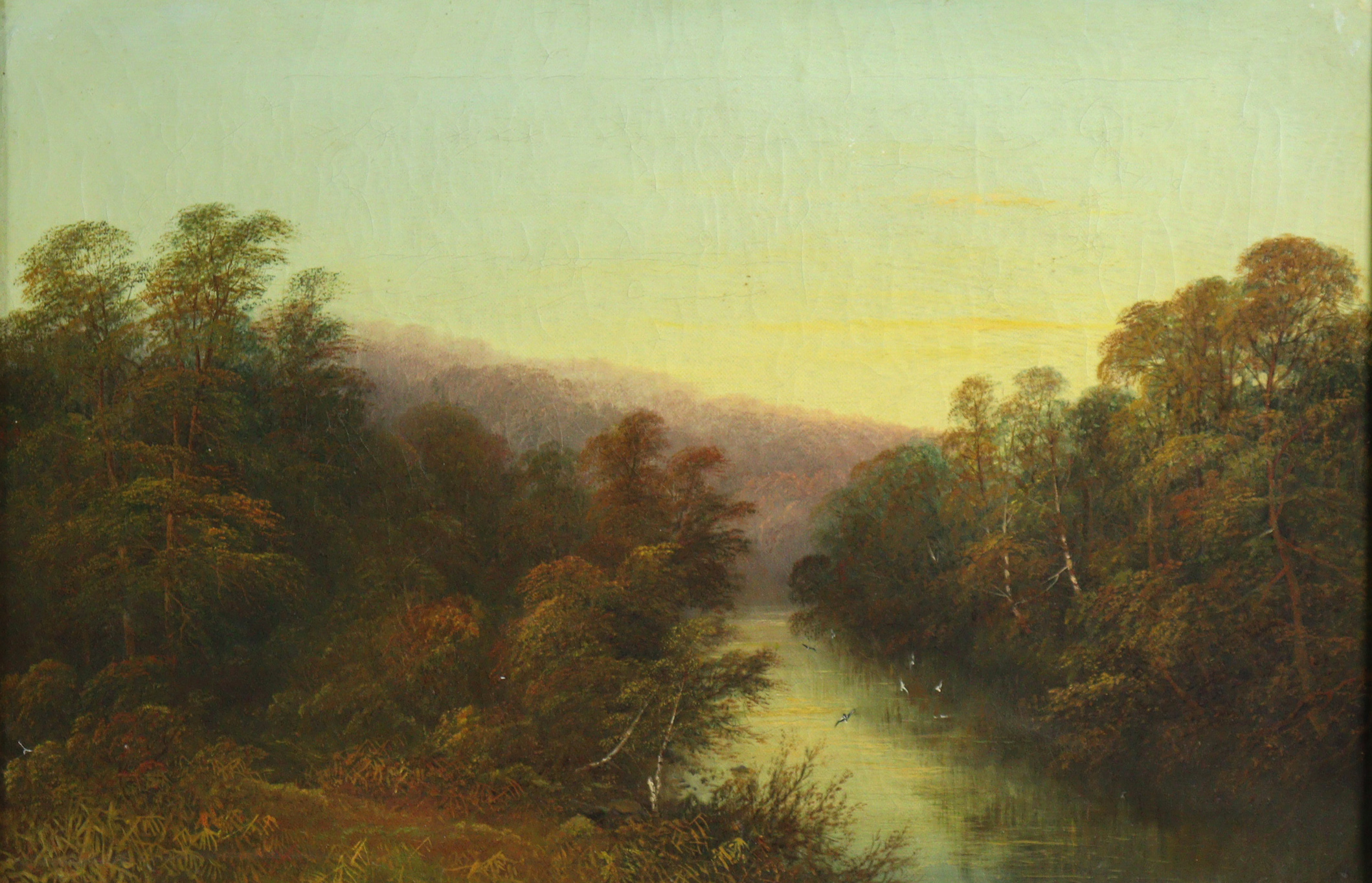 ENGLISH SCHOOL (19th century). A river landscape at sunset. Oil on canvas: 14” z 21”, in gilt