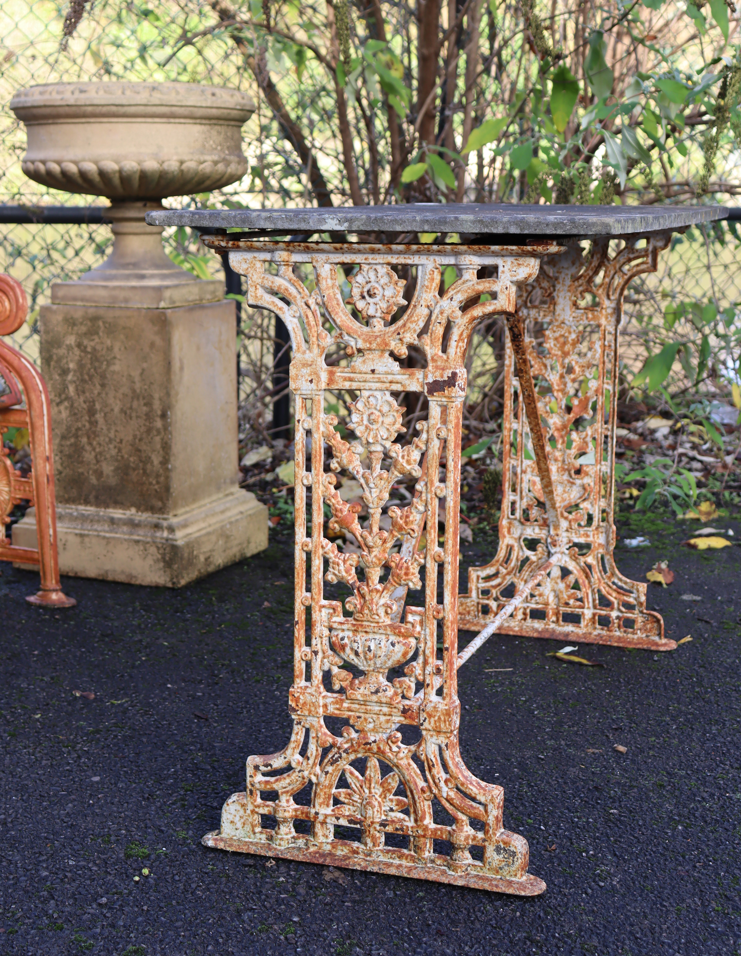 A 19th century cast iron garden table, the pierced ends of foliate design with rectangular stone - Image 2 of 5