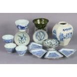 A Chinese blue & white porcelain small octagonal baluster vase decorated with precious objects &