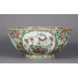 A 20th century Cantonese porcelain deep bowl with all-over famille rose decoration of flowers,
