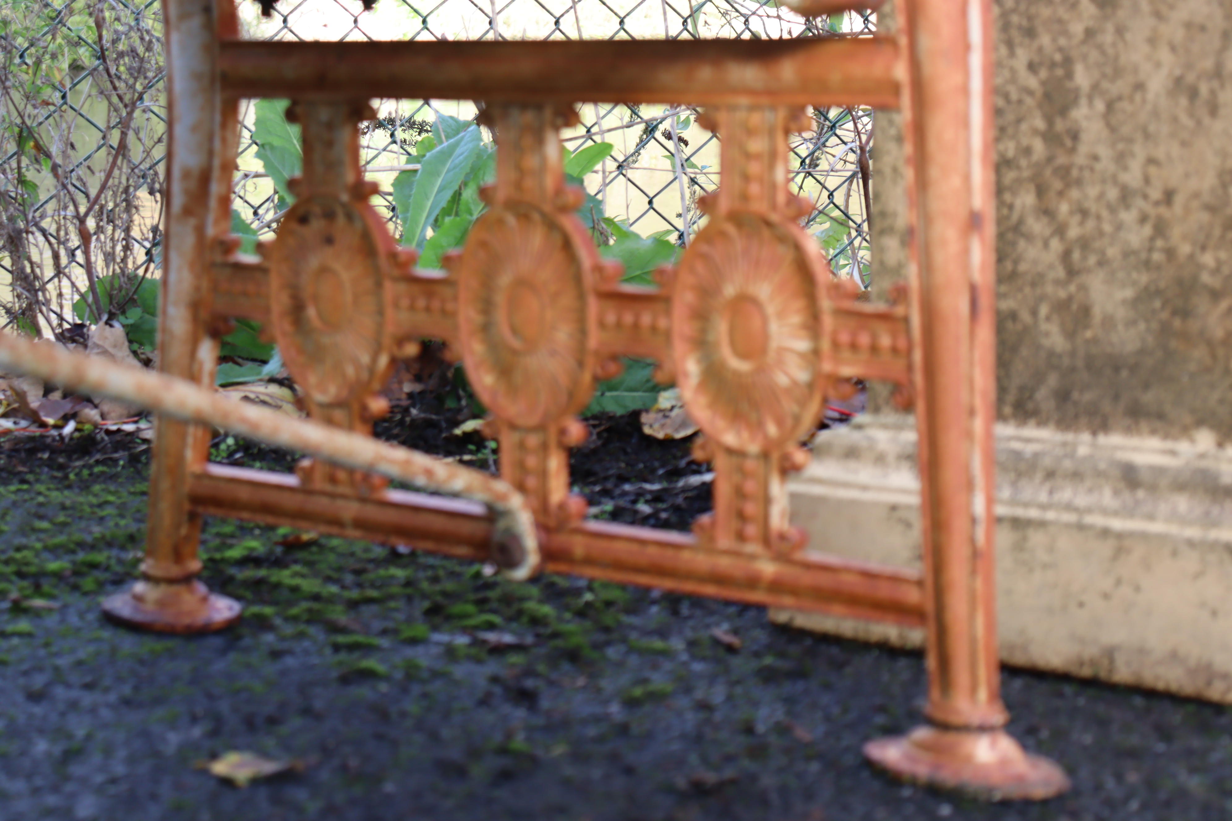 A 19th century Coalbrookdale cast iron garden bench, the pierced ends of Neoclassical design with - Image 10 of 10