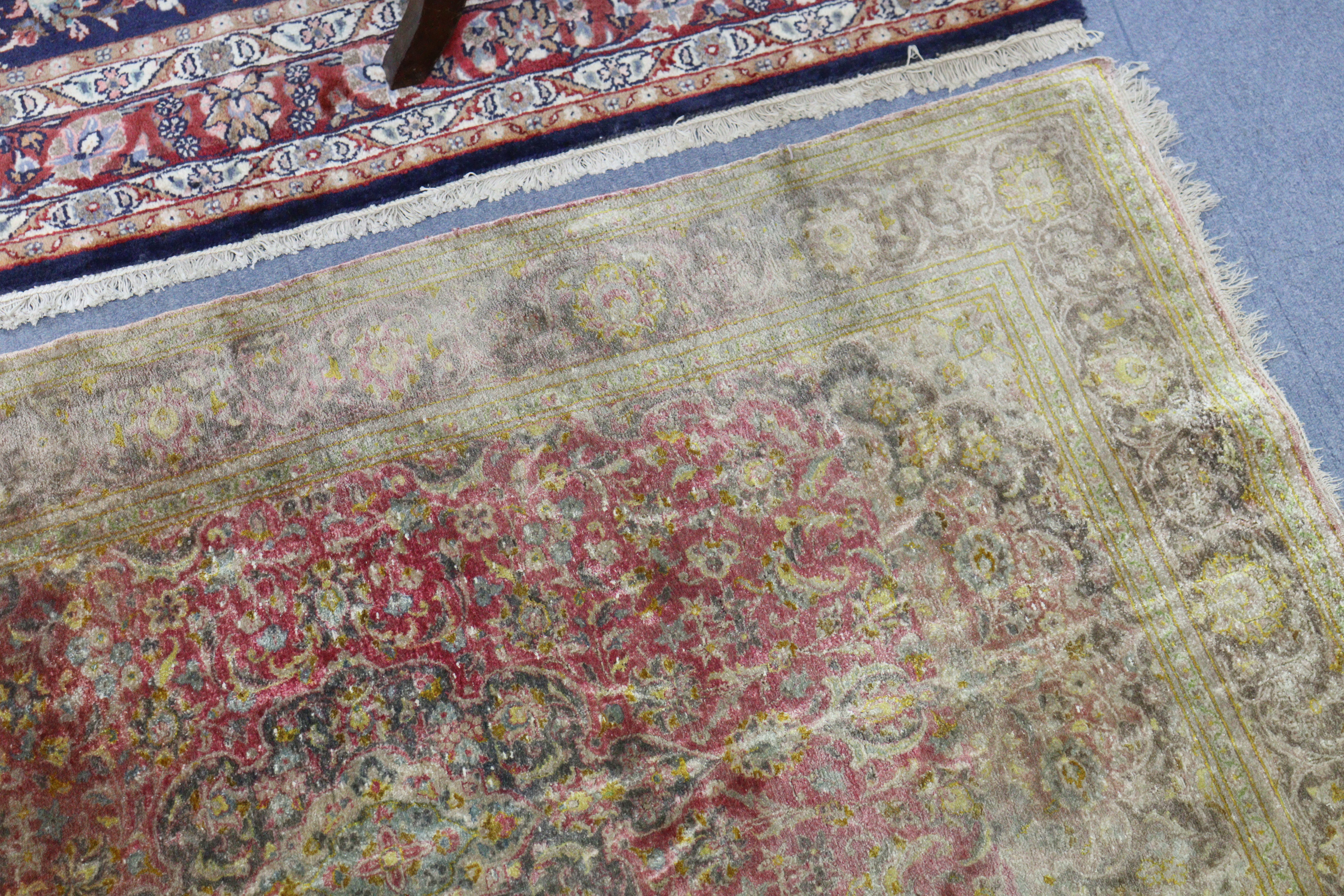 A Persian silk rug of crimson ground with central medallion in multiple foliate borders, 81" x 60". - Image 2 of 6