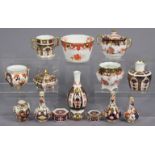 Fifteen various items of Derby & Royal Crown Derby Imari pattern porcelain (three small vases