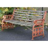 A 19th century Coalbrookdale cast iron garden bench, the pierced ends of Neoclassical design with