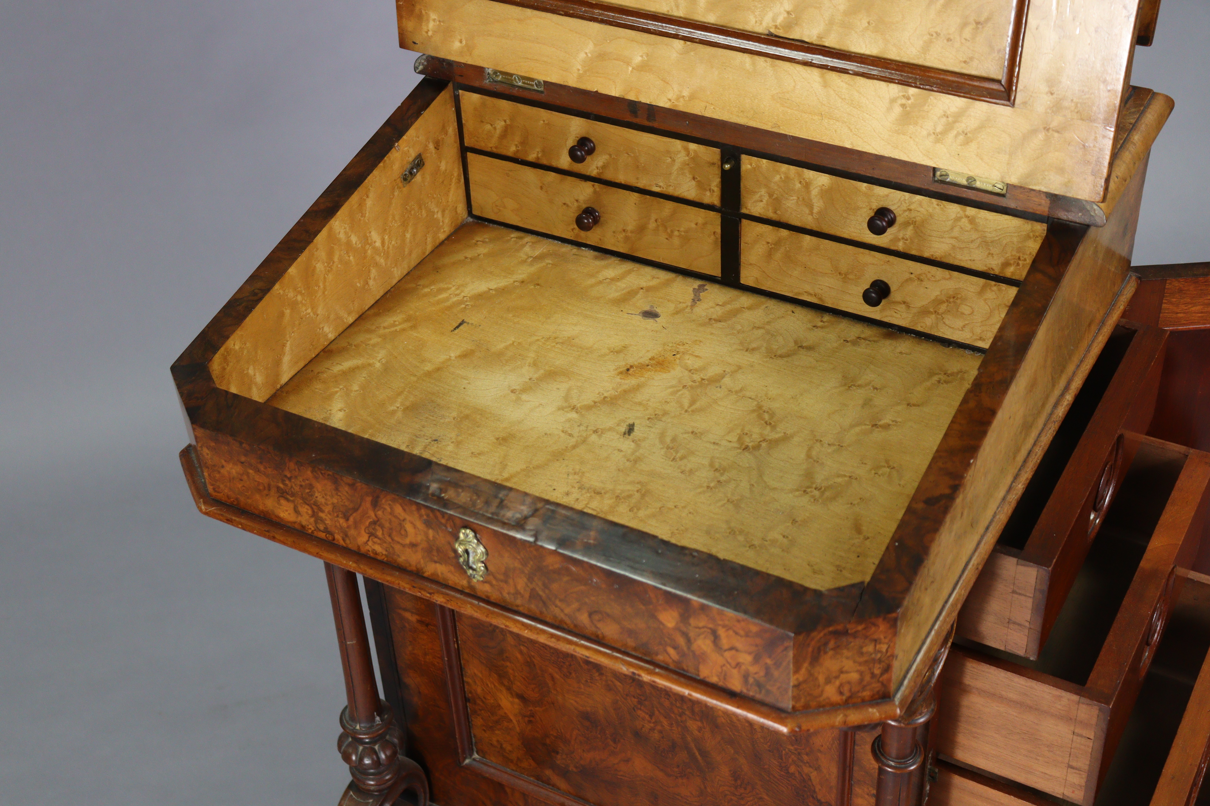 A Victorian burr-walnut davenport with satinwood interior enclosed by sloping hinged lid, inset - Image 6 of 11