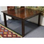 An Edwardian mahogany extending dining table in the mid-Georgian style, with plain rectangular top &