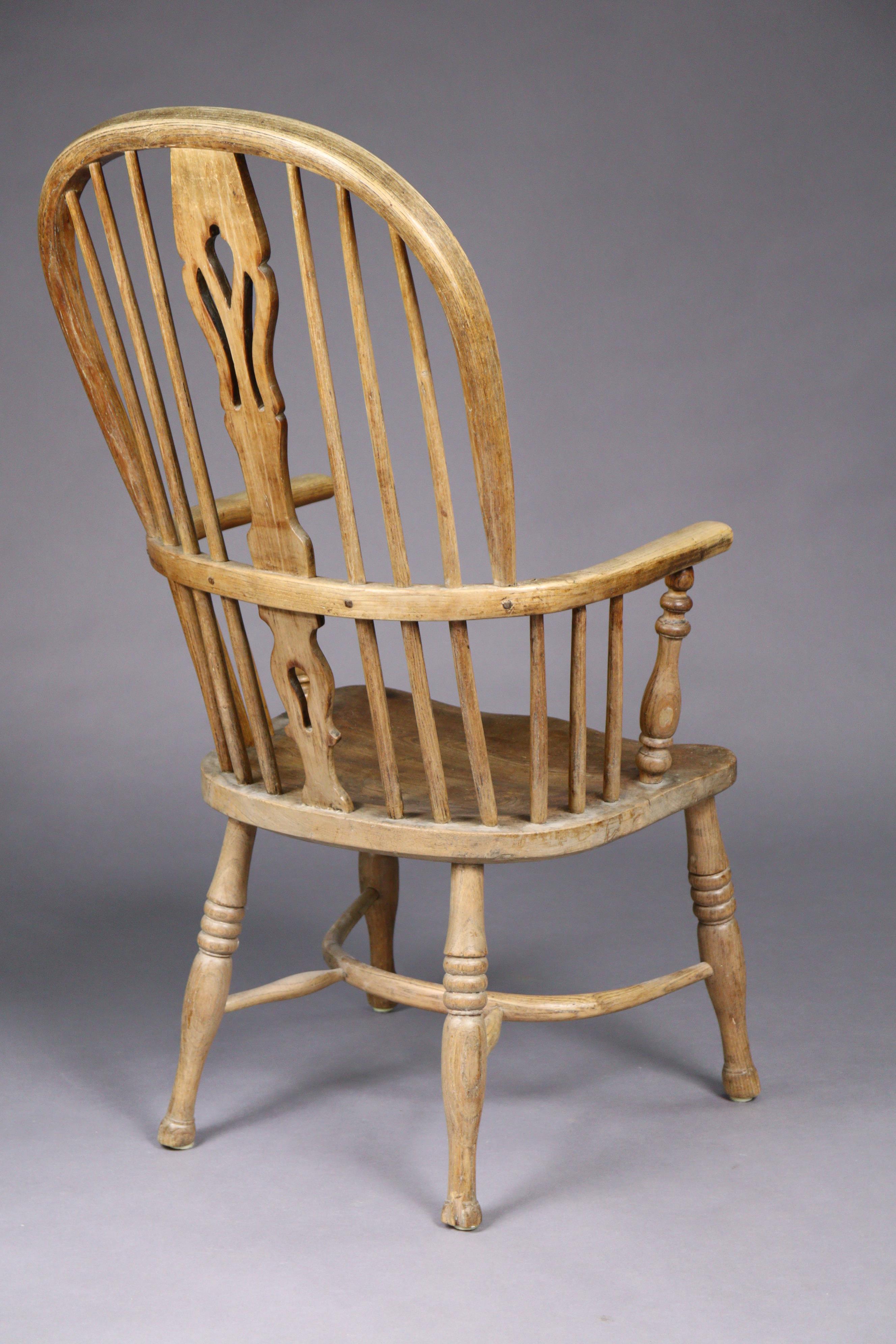 A 19th century ash & elm Windsor elbow chair with pierced & shaped splat to the hooped spindle back, - Image 3 of 4