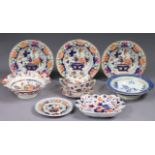 Three early/mid-19th century ironstone soup plates with brightly-coloured decoration of oriental