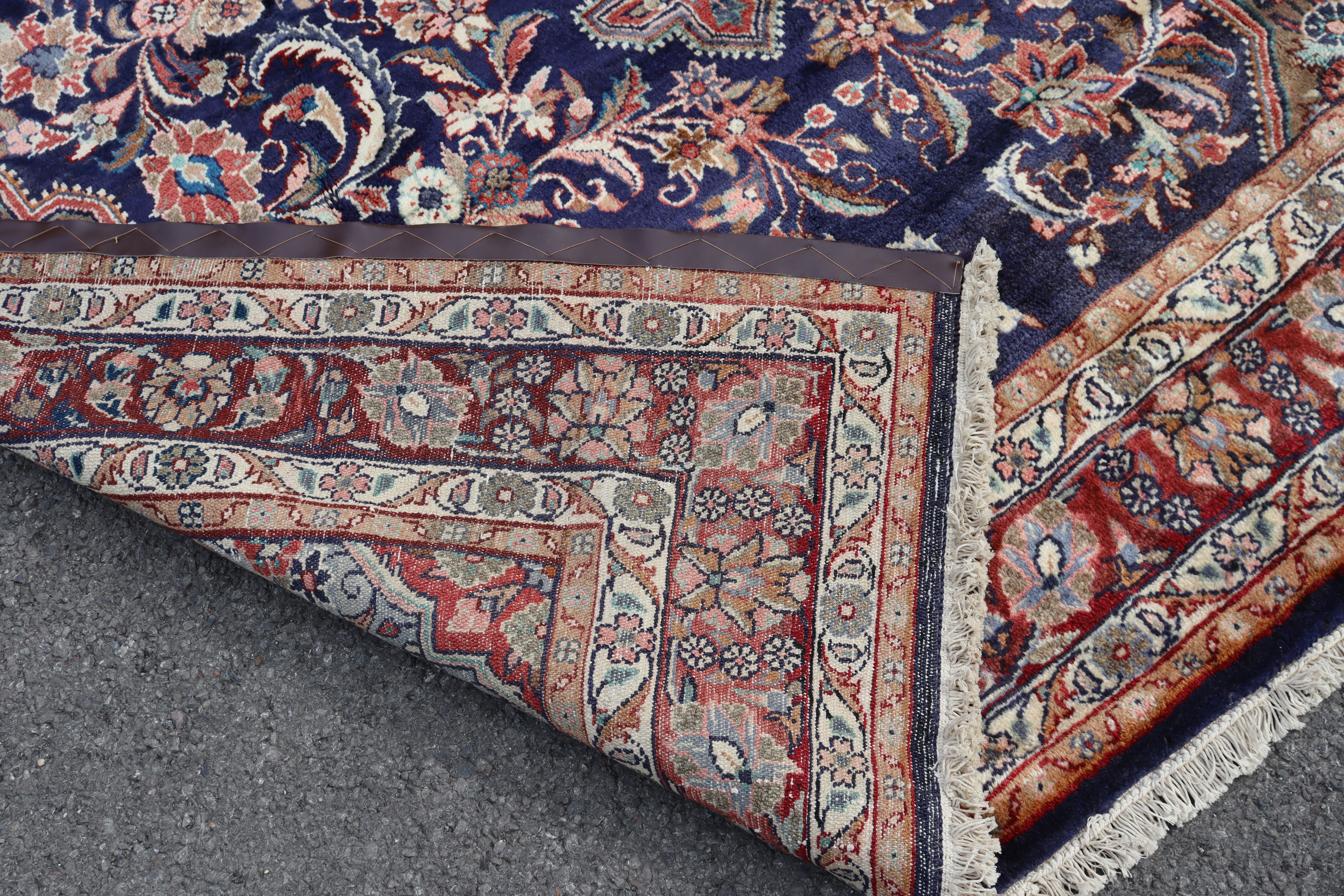 A North West Persian Hamadan rug of madder ground with geometric floral designs surrounded by narrow - Image 3 of 3