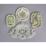Two Chinese carved & pierced white/russet jade pendants, 3½” x 5¾” & 3” dia.; & two pale green