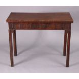 A Georgian mahogany tea table with rectangular fold-over top, on square chamfered legs, 36” wide x