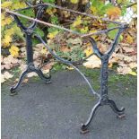 An early 20th century French cast iron garden table base (lacking top) 34" wide X 27" high X 17" de