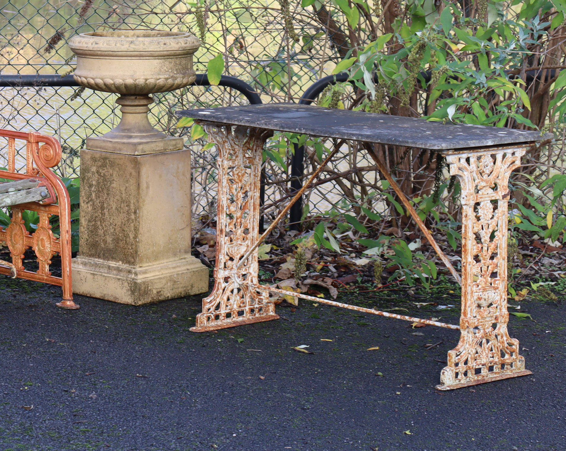 A 19th century cast iron garden table, the pierced ends of foliate design with rectangular stone - Image 3 of 5