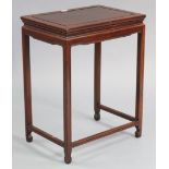 A Chinese hardwood rectangular occasional table, on four square legs with plain stretchers, 20” wide