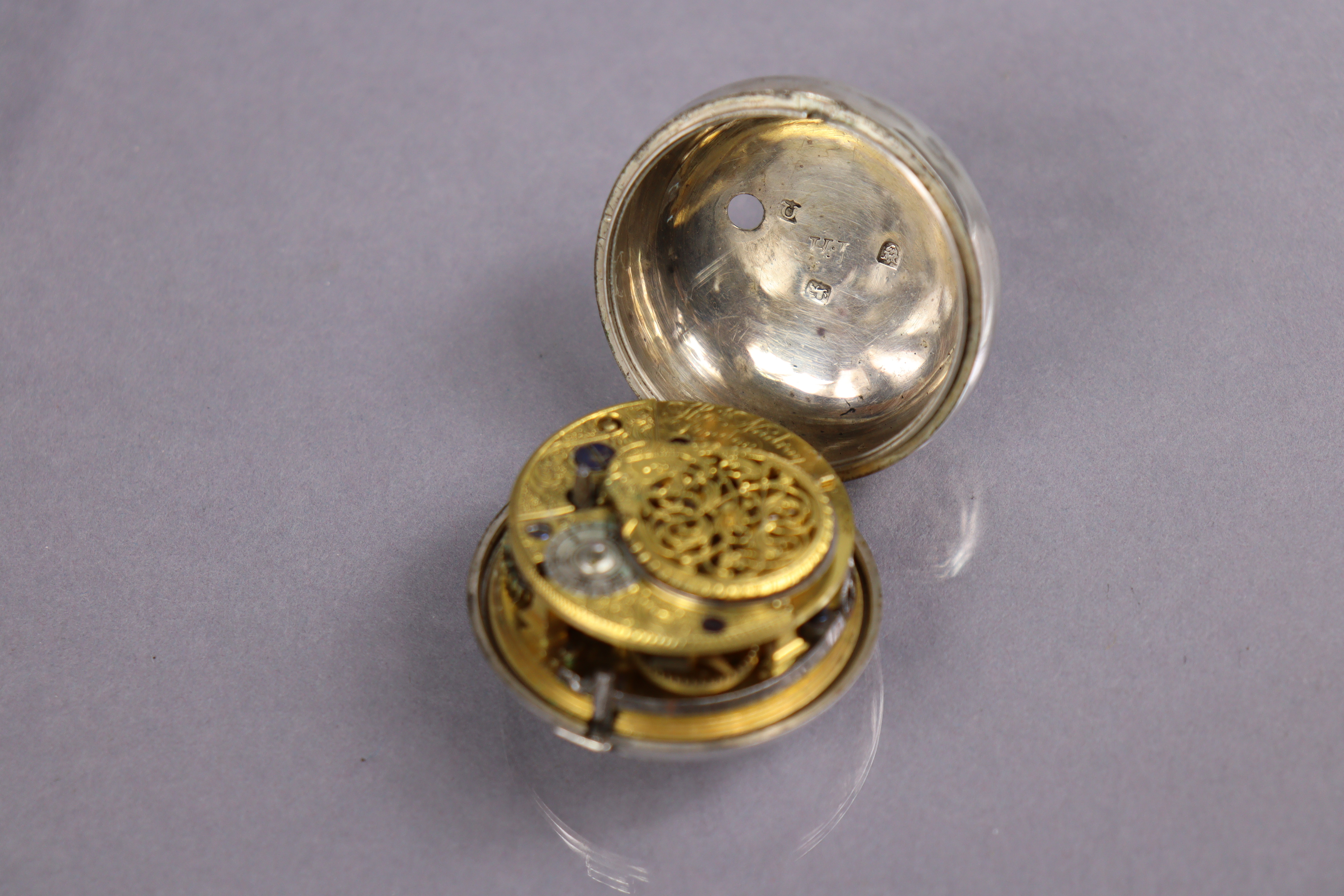 An 18th century silver pair-cased pocket watch, the convex white enamel dial with black roman - Image 5 of 8