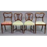 A pair of regency rosewood dining chairs with kidney-shaped backs & padded drop-in seats, & a pair