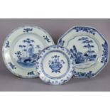 An 18th century Chinese blue & white porcelain shallow bowl decorated with bamboo, peony, &