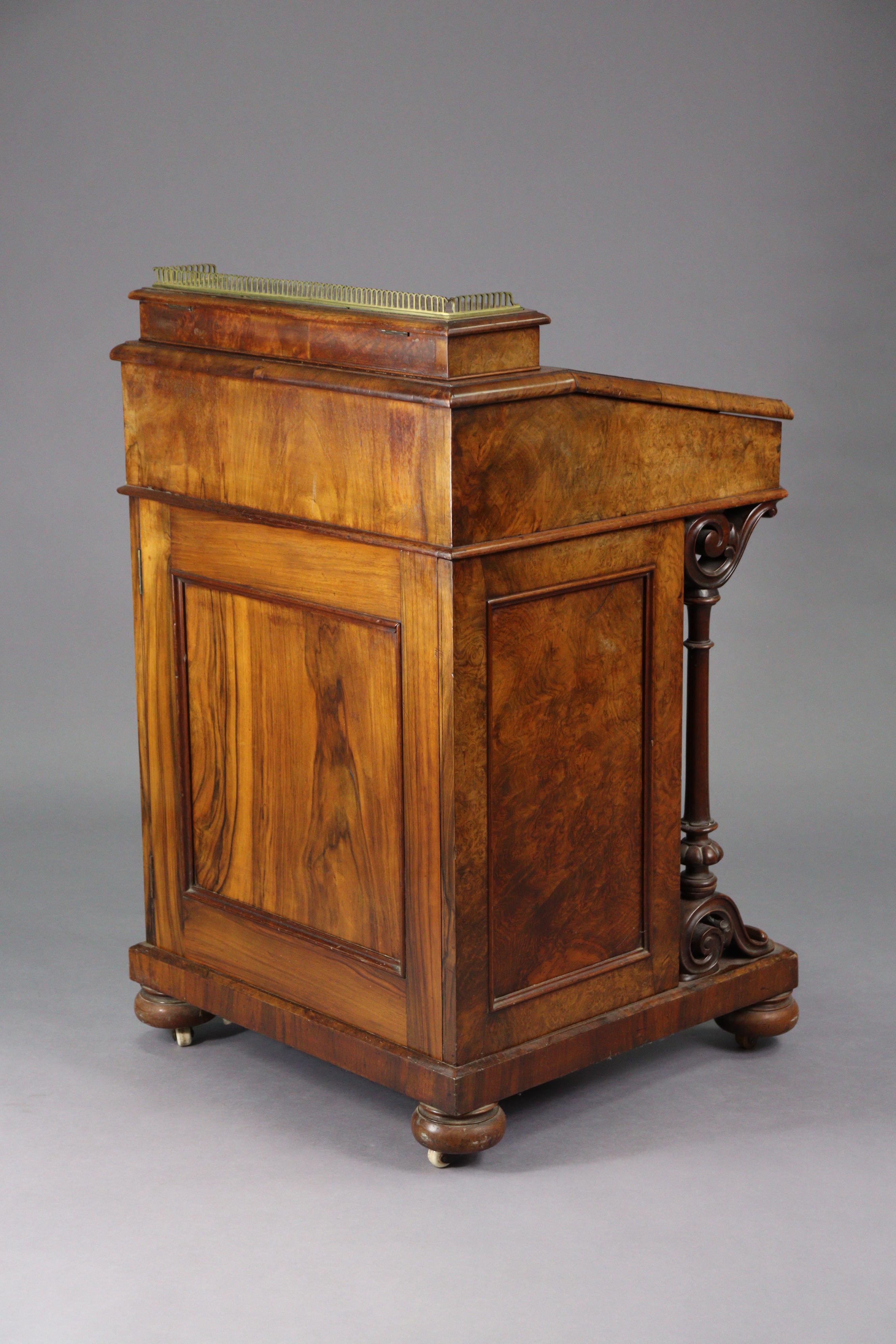 A Victorian burr-walnut davenport with satinwood interior enclosed by sloping hinged lid, inset - Image 5 of 11