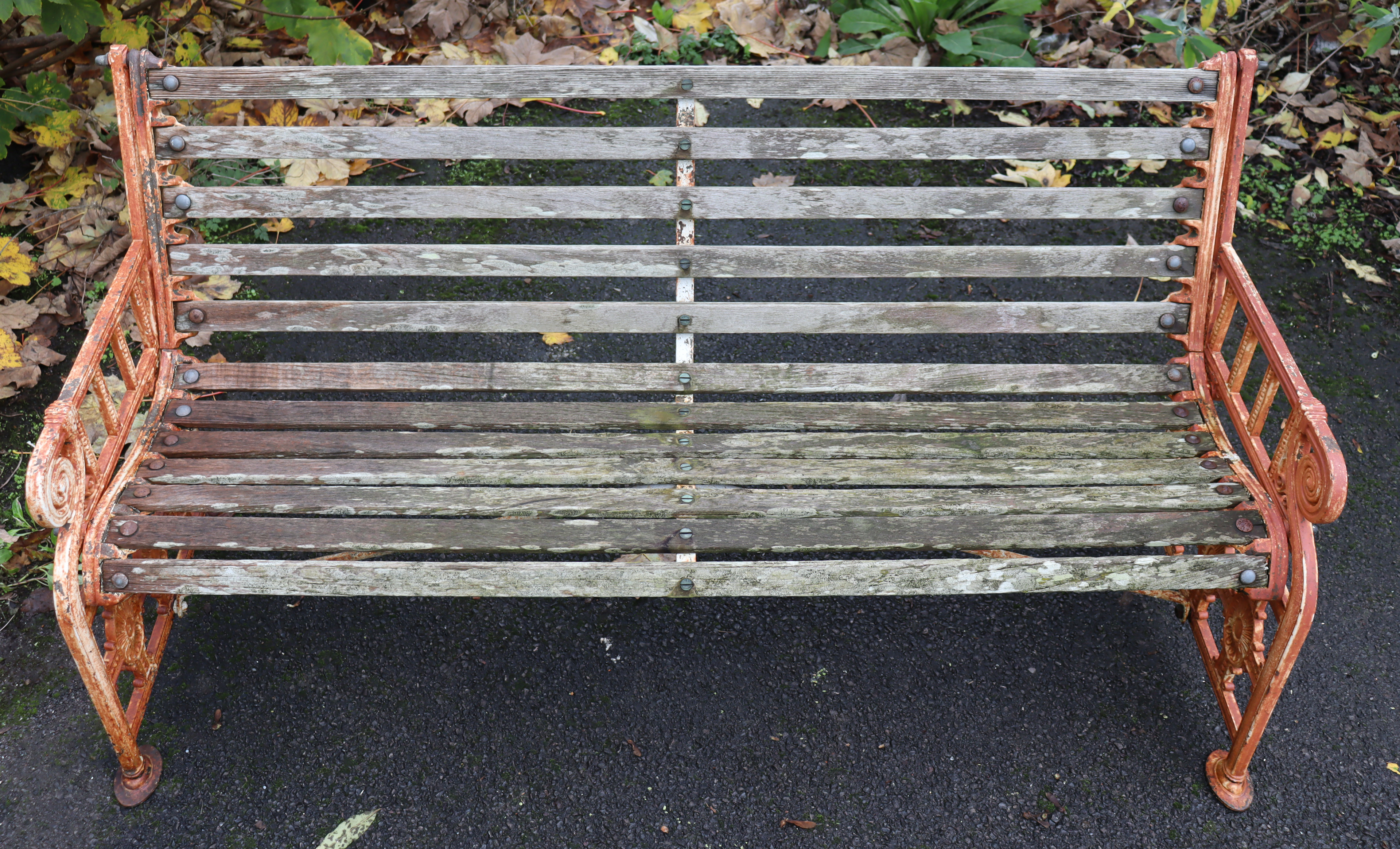 A 19th century Coalbrookdale cast iron garden bench, the pierced ends of Neoclassical design with - Image 5 of 10