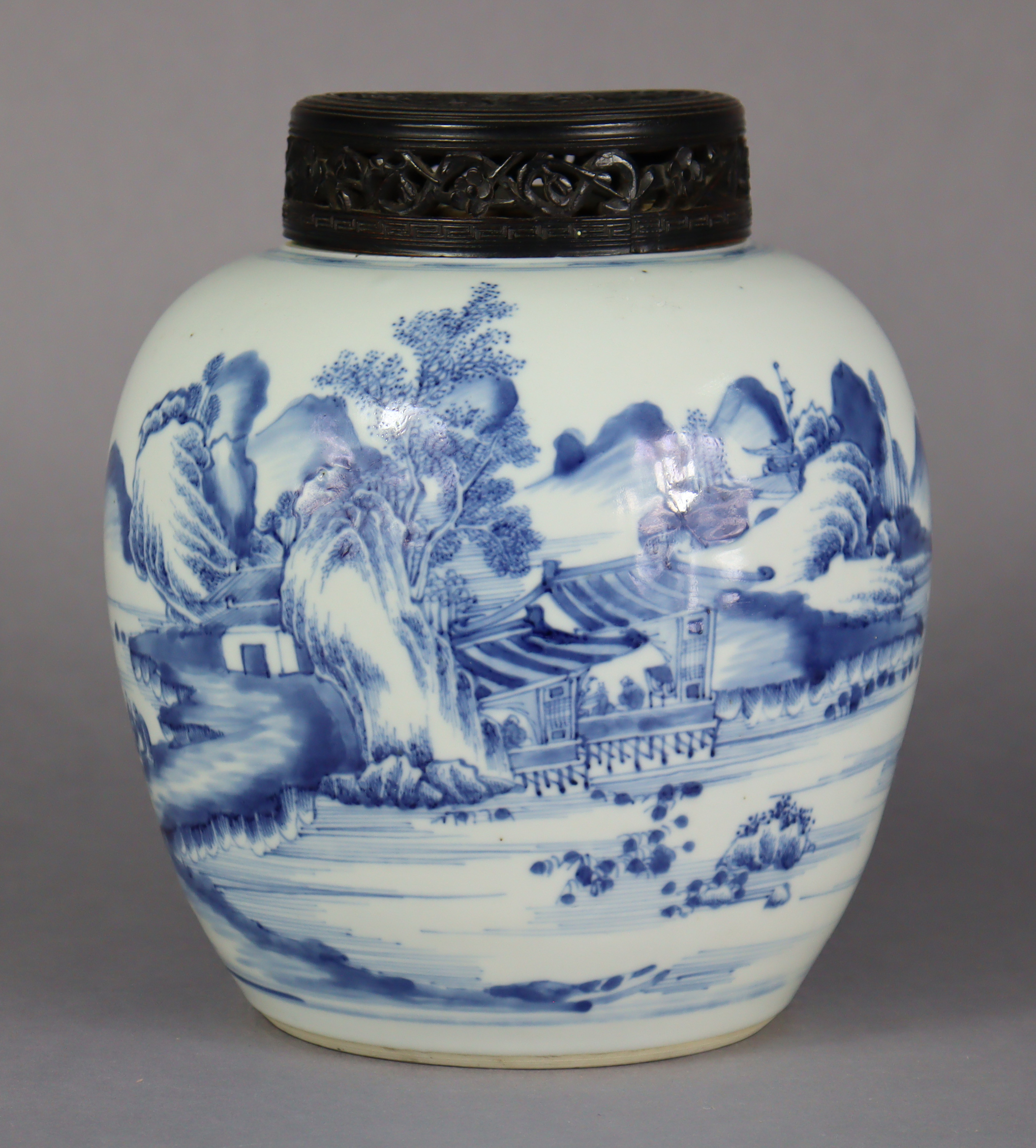 An 18th century Chinese blue & white porcelain ginger jar painted with a continuous landscape, &