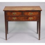 A Georgian mahogany & pine side table with plain rectangular top, fitted one long & two short frieze