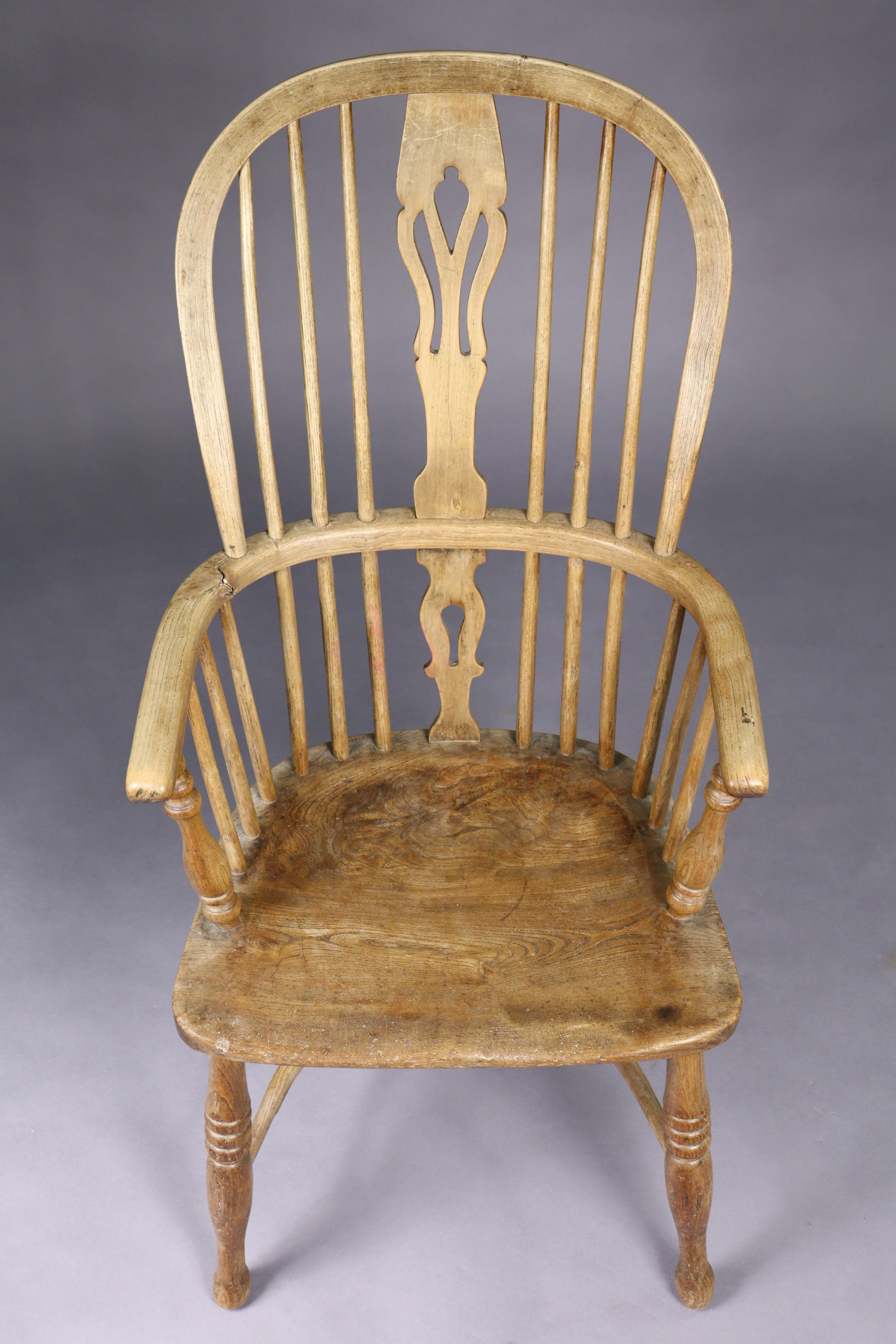 A 19th century ash & elm Windsor elbow chair with pierced & shaped splat to the hooped spindle back, - Image 2 of 4