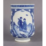 An 18th century Chinese blue & white porcelain tankard of baluster form, the central cartouche depic