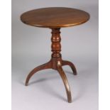 A Georgian mahogany & elm tripod table with circular tilt-top on vase-turned centre column & splay