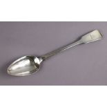 A large Fiddle pattern basting spoon with engraved crest to the terminal, 11¾” long, possibly