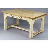 A continental-style natural and white painted beech kitchen table with rectangular top, fitted