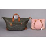 A Brics pink ladies’ handbag, & a ditto black holdall