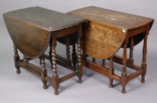 Two 1930’s oak oval gate-leg dining tables one on baluster-turned legs, the other on barley-twist