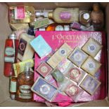 A L’occitane cosmetics display box, & various assorted cosmetics.