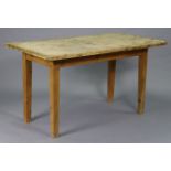 A pine kitchen table with rounded corners to the rectangular top, & on four square tapered legs, 54”