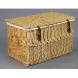 A large wicker hamper, 35” wide x 21” high.