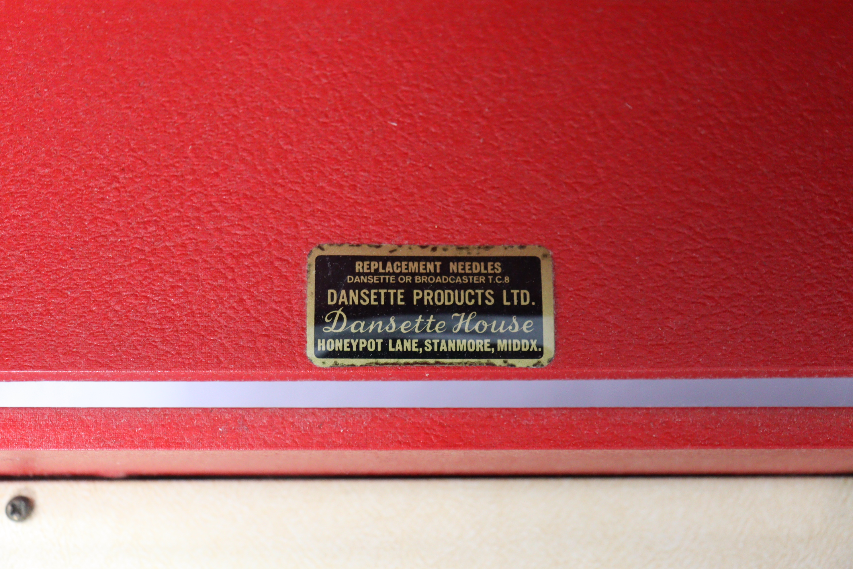 A vintage Dansette portable record player in red & cream fibre-covered case. - Image 4 of 4