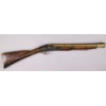 A MID 18th century ENGLISH FLINTLOCK BLUNDERBUSS, the brass barrel in three stages with ball