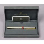 A Nazareno Gabrielle of Italy silver-cased fountain pen, with a cloth-covered travelling case.