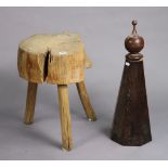 A wooden chopping block on three round legs, 13½” wide x 18½” high, & a mahogany bedpost finial, 24”