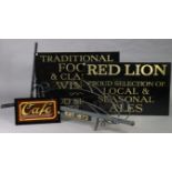 A rectangular coloured glass sign “Café”, 20” x 12”; two Red Lion Inn signs; and a black-painted