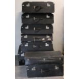 Nine various vintage fibre-covered musical instrument cases.
