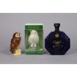 A Royal Doulton novelty ceramic “Snowy Owl” bottle of Whyte & Mackay Scotch Whisky, with contents,